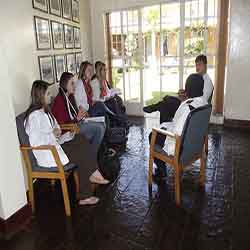 University students receiving their clinical palliative care lecture from Leratong Nurse